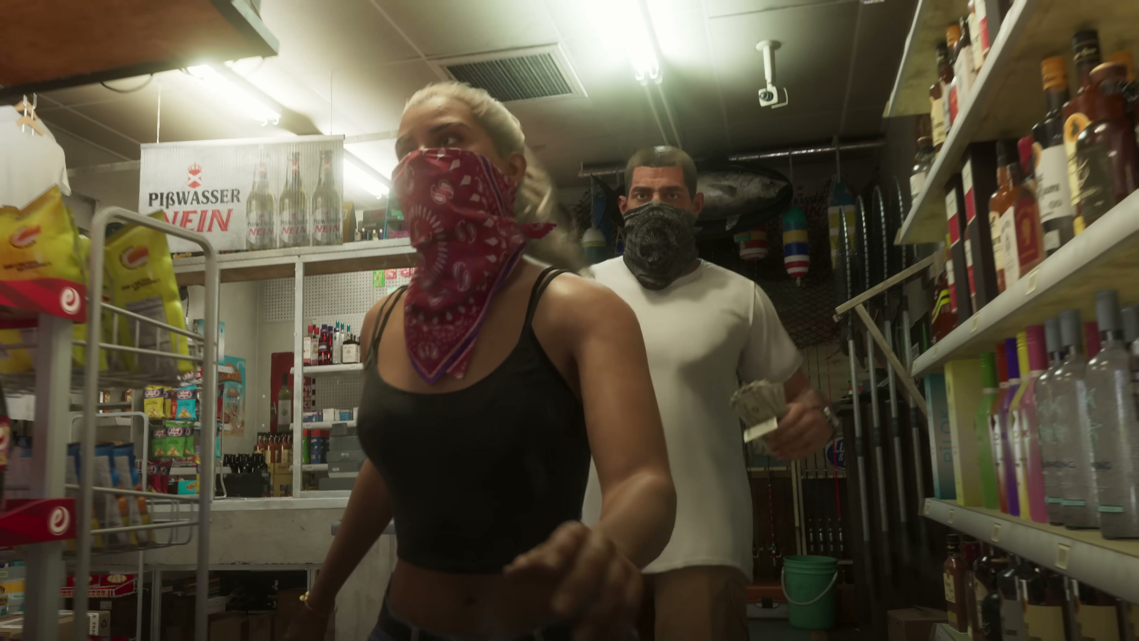 Jason in a white t-shirt and dark mask follows Lucia through a convenience store during a robbery.