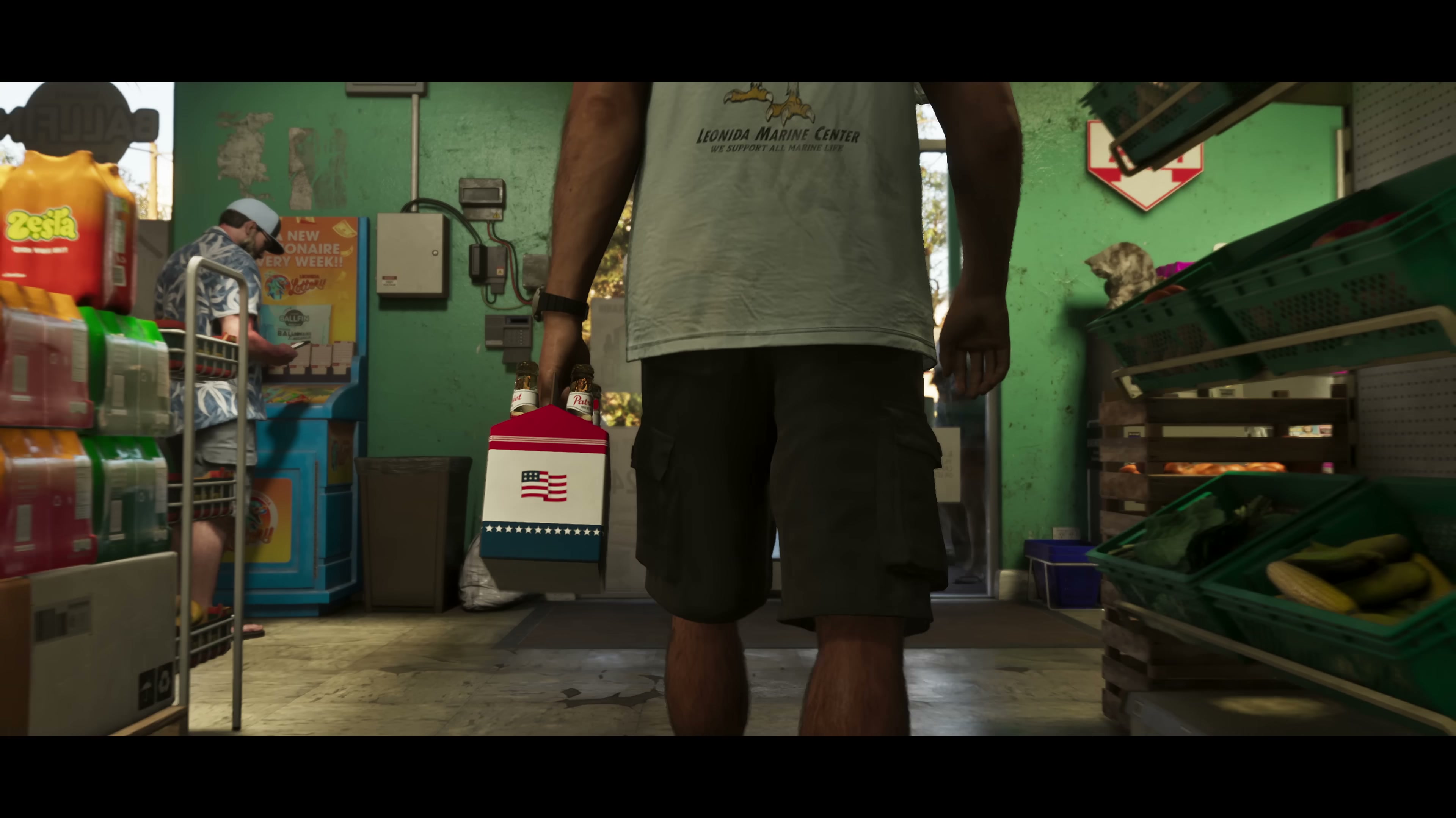 Interior of a Leonida convenience store with a customer carrying a six-pack of beer past coolers and produce displays.
